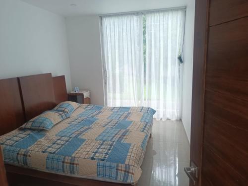 Postel nebo postele na pokoji v ubytování Casa blanca