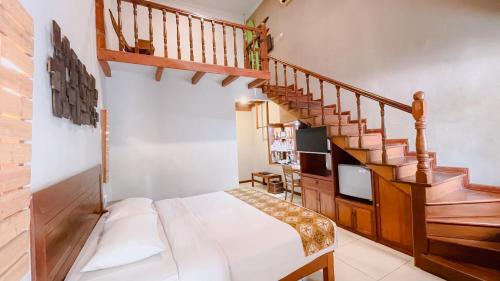 Bukit Daun Hotel & Resortにあるベッド