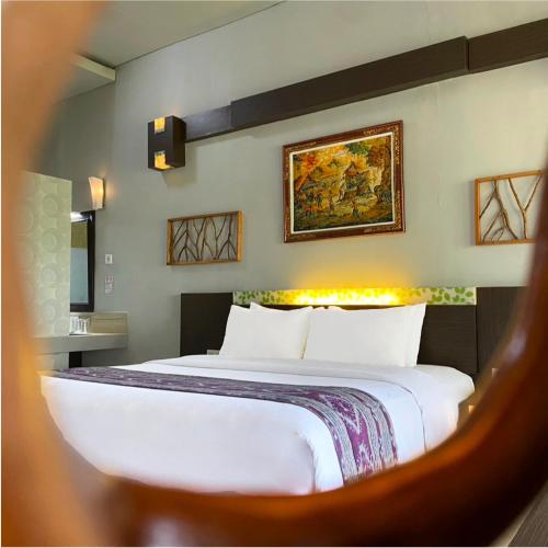 Bukit Daun Hotel & Resortにあるベッド