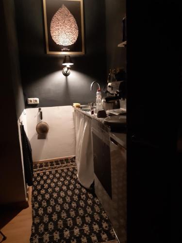 a kitchen with a sink and a counter top at Power of Bad Gastein in Bad Gastein