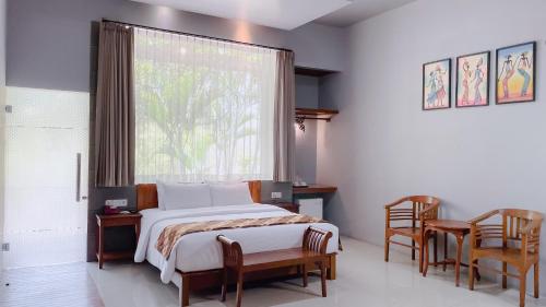 Bukit Daun Hotel & Resortにあるベッド