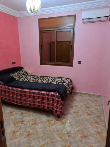 Postel nebo postele na pokoji v ubytování Nour's PLACE