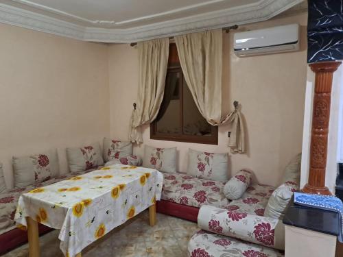 Postel nebo postele na pokoji v ubytování Nour's PLACE