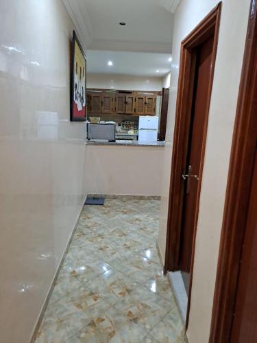Kuchyň nebo kuchyňský kout v ubytování Nour's PLACE
