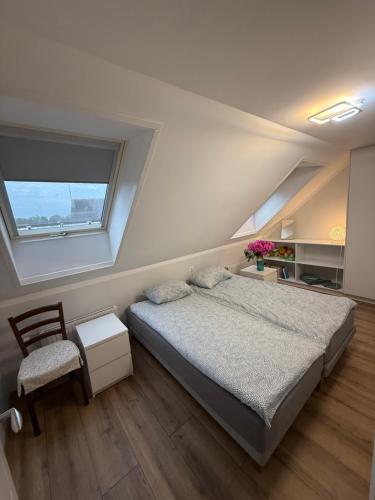 Katil atau katil-katil dalam bilik di Apartamenti Bocmaņa laukums 2A, Salacgrīva