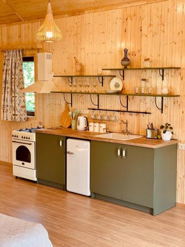 Kuchyň nebo kuchyňský kout v ubytování Chalet Harmony
