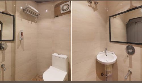 a bathroom with a toilet and a sink at Hotel Royal Palm Inn in Faizābād