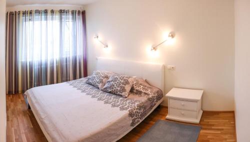 Postel nebo postele na pokoji v ubytování Metsa 49 Apartment
