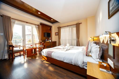 Postel nebo postele na pokoji v ubytování Kathmandu Suite Home