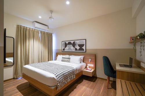 Voodi või voodid majutusasutuse Olive Hotel Dairy Circle by Embassy Group toas