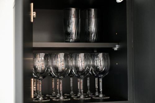 a row of wine glasses on a shelf at Oyakata Sekigahara, near the Tokugawa Ieyasu Battle of Sekigahara and Nakasendo, 8LDK, 1 building for rent in Sekigahara