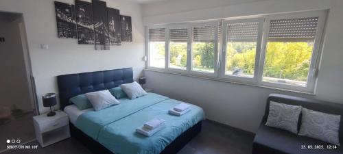 Ένα ή περισσότερα κρεβάτια σε δωμάτιο στο Studio apartman Sirius