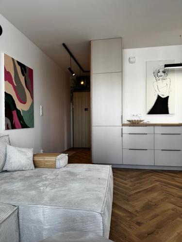 Postel nebo postele na pokoji v ubytování Japandi Apartment Pogórze