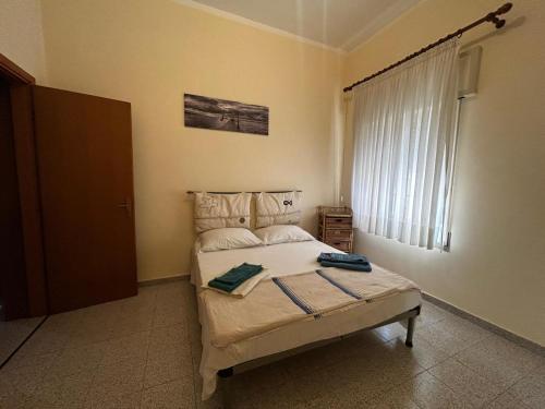 Ένα ή περισσότερα κρεβάτια σε δωμάτιο στο La Dimora di Bianca