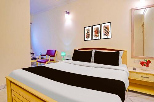 Postel nebo postele na pokoji v ubytování Townhouse Nirman Nagar Mansarovar