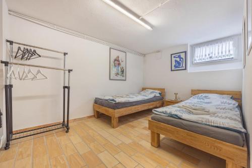 a room with two beds in a room at Tulip Path 3 in Melle