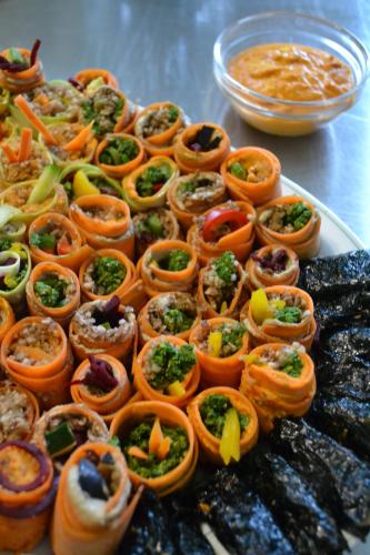 a tray of food with vegetables and other foods at Naturkost-Hotel Harz in Bad Grund