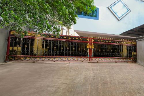 an ornate gate in front of a building at Collection O Akkayaplem Near Railway Station in Visakhapatnam