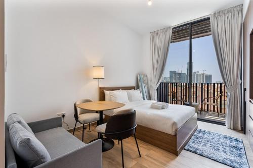 Bright Studio in JVC with Pool and Gym Access
