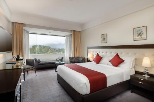 Postel nebo postele na pokoji v ubytování Hotel Himalaya