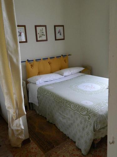 Ένα ή περισσότερα κρεβάτια σε δωμάτιο στο B&B Casa Fedora