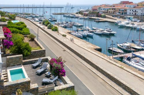 a view of a marina with boats in the water at Casa Katy Sul Porto Di Stintino in Stintino