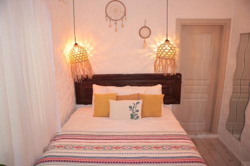 Postel nebo postele na pokoji v ubytování SİSU ALAÇATI OTEL