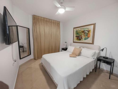 Кровать или кровати в номере Breeze Suite at The Island