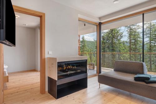 Χώρος καθιστικού στο Chalet Magdalena und Lodges