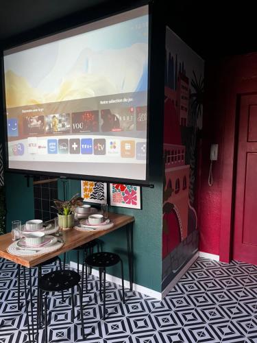 TV a/nebo společenská místnost v ubytování Atelier de Lisa