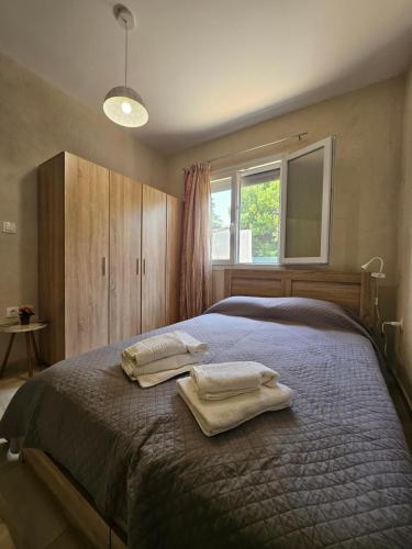 Ένα ή περισσότερα κρεβάτια σε δωμάτιο στο Villa Pelagie Dream