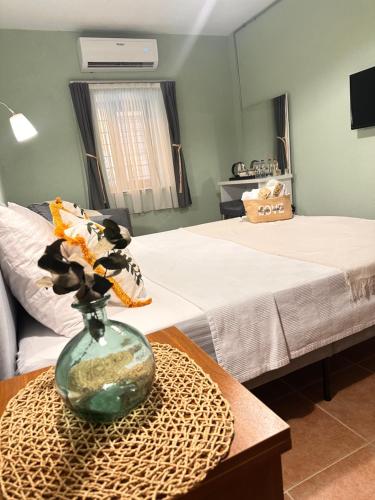 Кровать или кровати в номере Hanole Macaron Guest House