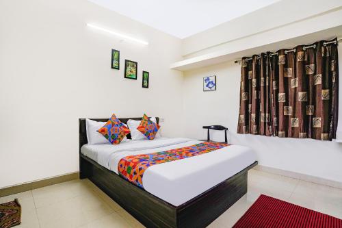 Katil atau katil-katil dalam bilik di FabHotel Komfort Inn - Nr Twin Tower