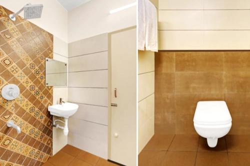un bagno con un water e un lavandino di Harsha Comforts a Chikmagalūr