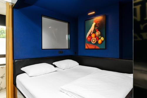 Postel nebo postele na pokoji v ubytování ibis Styles Hasselt City Centre