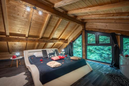 Χώρος καθιστικού στο Le Chalet des Buch avec Spa