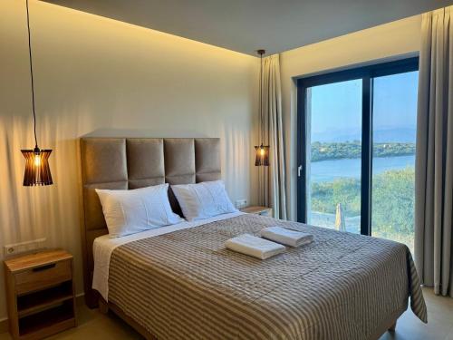 Postel nebo postele na pokoji v ubytování Villa Emys by PosarelliVillas