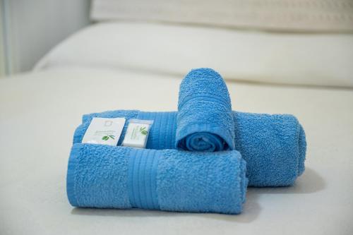a blue roll of thread sitting on a table at Casa Nucci - Free WIFI - 100mt from the beach in San Stèfano