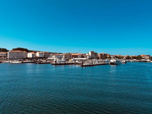 a view of a harbor with boats in the water at Hotel Argibay in O Grove