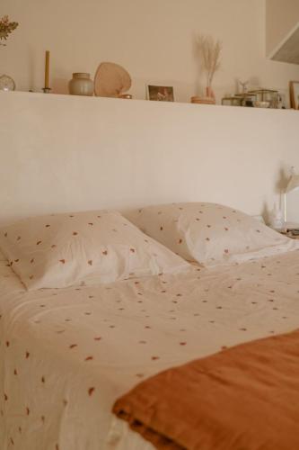 Postel nebo postele na pokoji v ubytování Maison Source