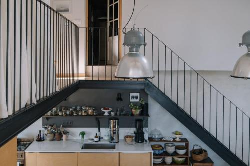 Kuchyň nebo kuchyňský kout v ubytování Maison Source