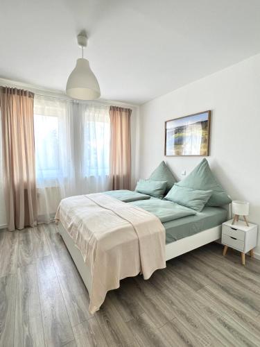 a bedroom with a large bed in a room at Ferienwohnung Burgstraße in Manderscheid