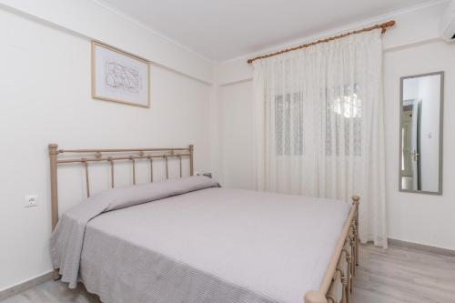 Ένα ή περισσότερα κρεβάτια σε δωμάτιο στο Luxury apartment in Chios 2
