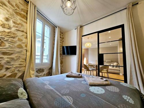 Postel nebo postele na pokoji v ubytování Le Championnet - Proche du Port