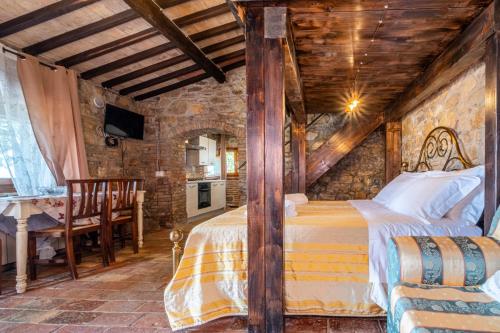 Cama o camas de una habitación en Agriturismo Beata Vanna
