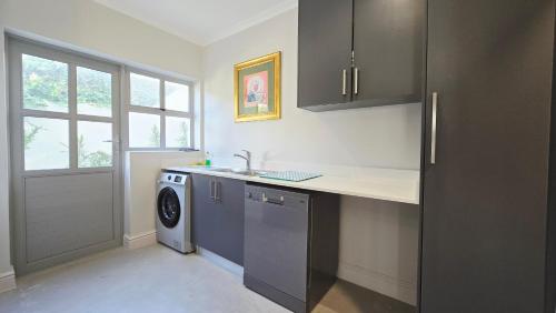 Η κουζίνα ή μικρή κουζίνα στο Kasteelberg Place • Stay
