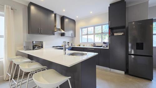 Η κουζίνα ή μικρή κουζίνα στο Kasteelberg Place • Stay