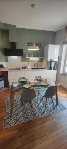 Kuchyň nebo kuchyňský kout v ubytování Résidence Leclerc - Appartements d'hôtes - Secteur thermal