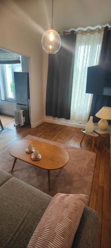 Posezení v ubytování Résidence Leclerc - Appartements d'hôtes - Secteur thermal