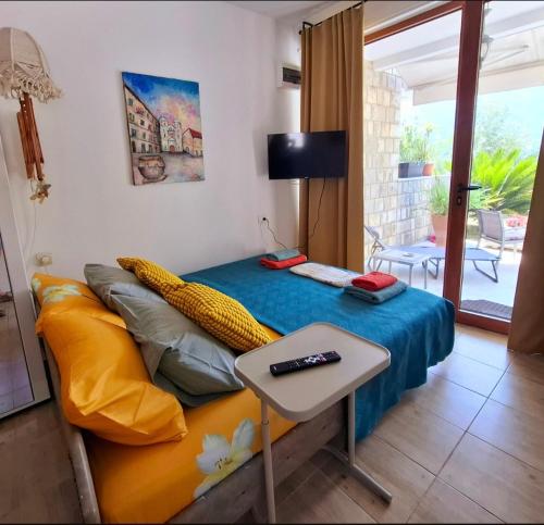 Voodi või voodid majutusasutuse Kadena Apartments toas